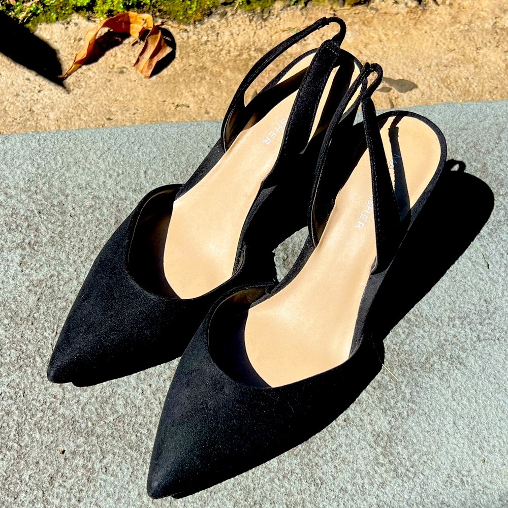 Marc Fisher black sling back point toe shoes.